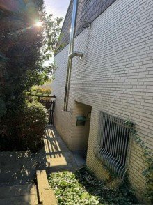 Eingang UG Gro�z�giges Architekten Zweifamilienhaus mit spektakul�rer, unverbaubarer Fernsicht